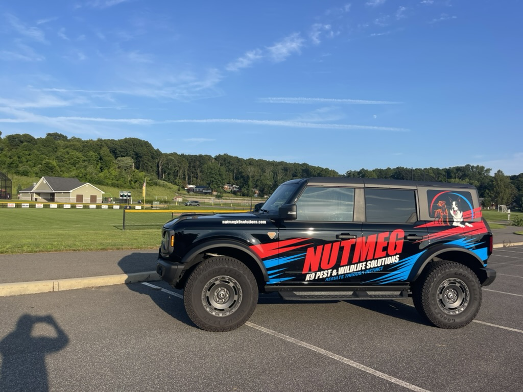 Nutmeg K9 service vehicle at a managed Connecticut property